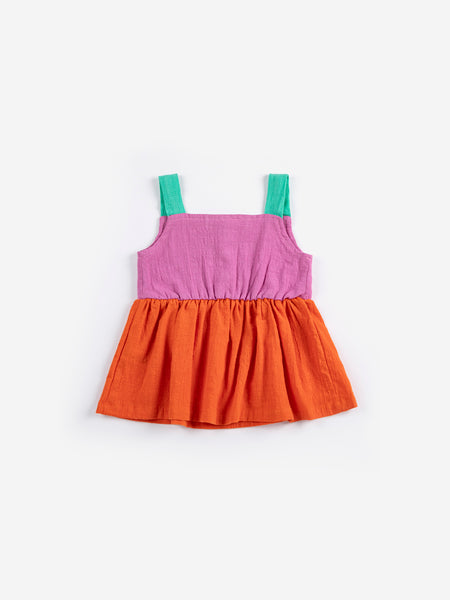 woven baby dress | pixel daisy color block