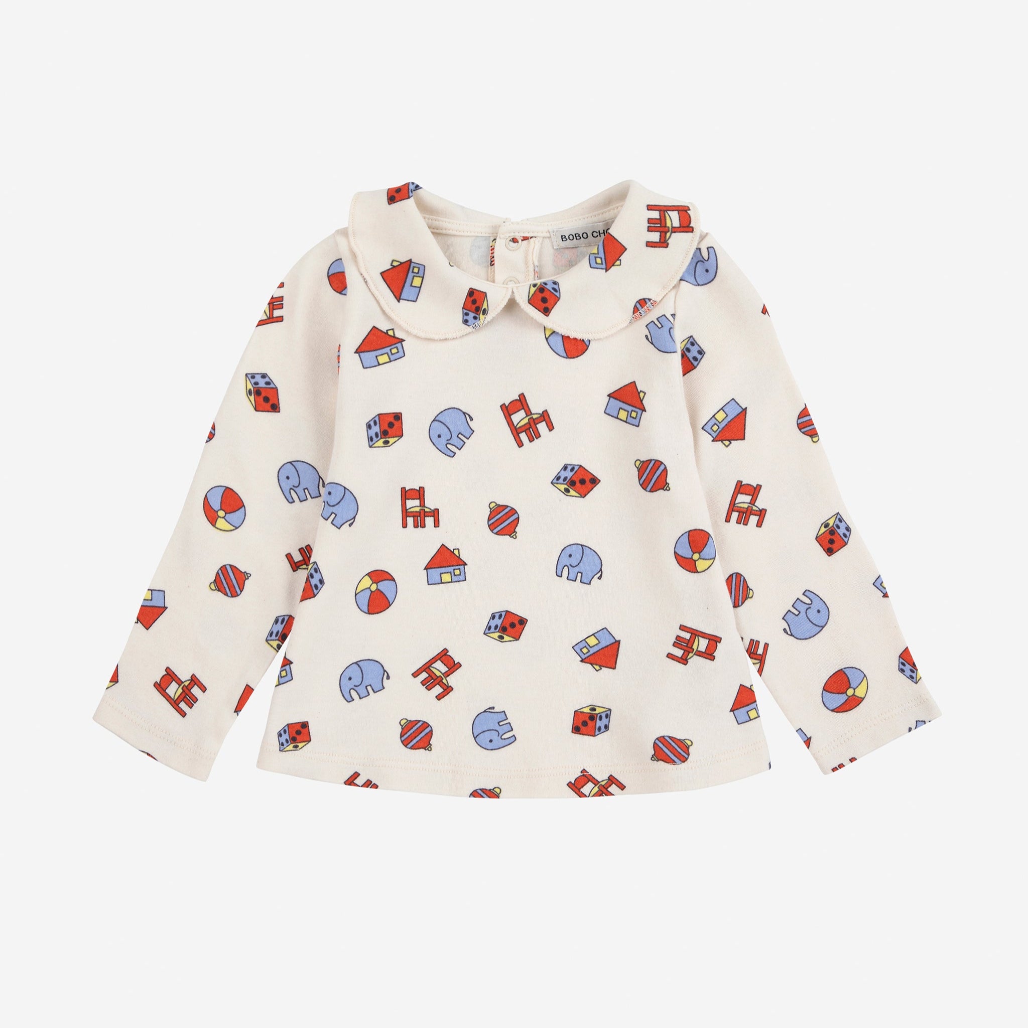 Children's shirt with colorful pattern on a white background