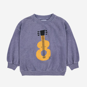 sweatshirt | acoustic guitar