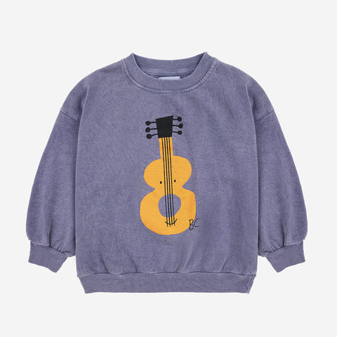 sweatshirt | acoustic guitar
